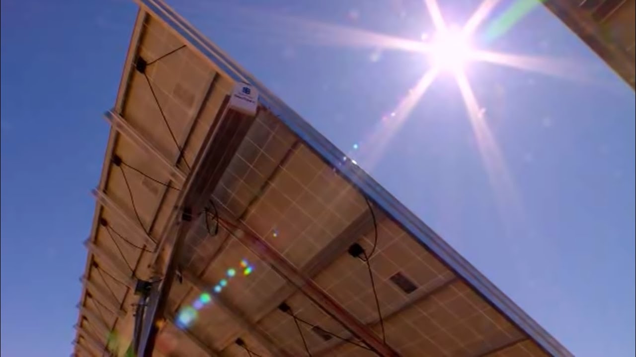 Solar panels beneath a bright sun, from the U.S. Department of Energy’s solar-energy video